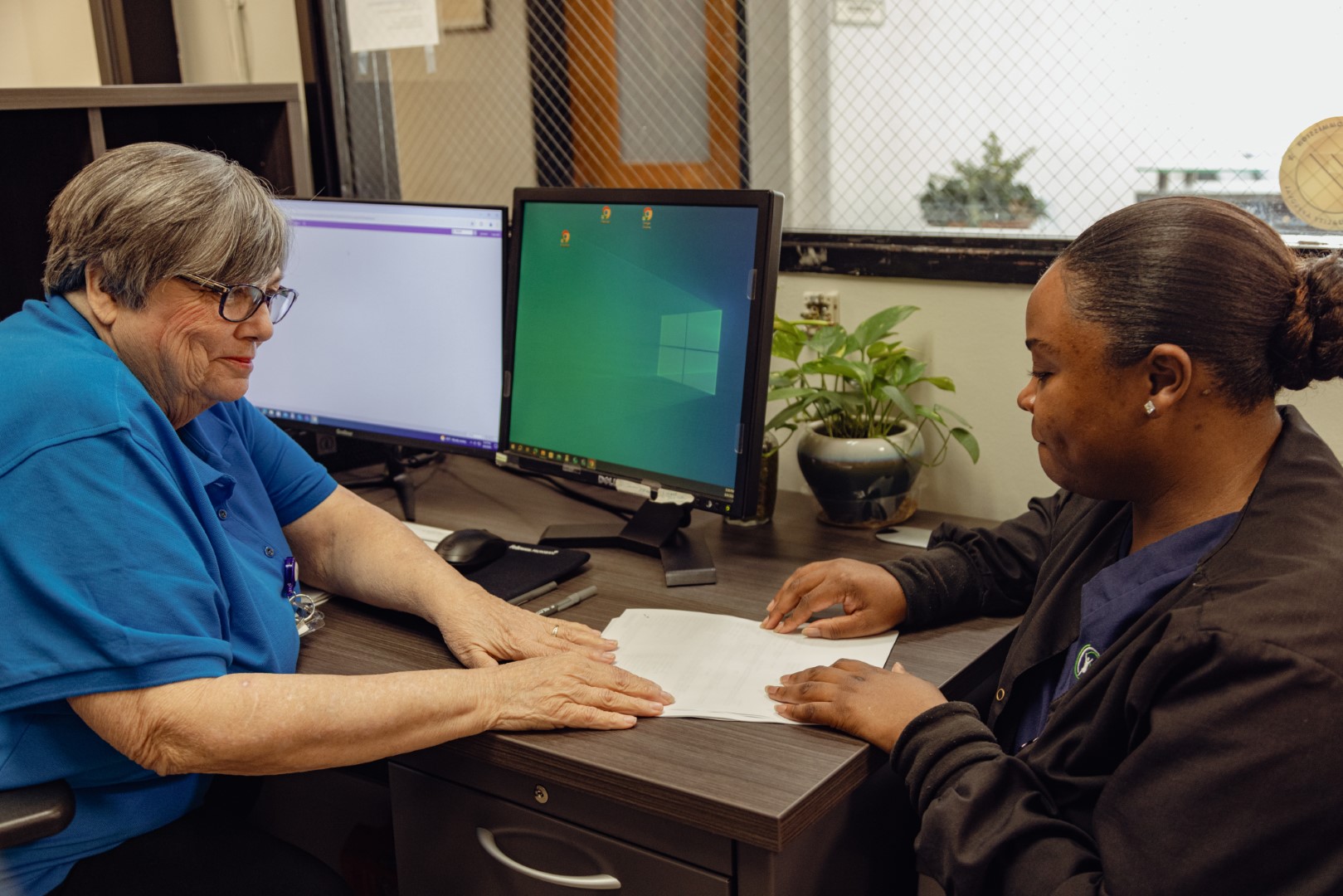 Care team member meeting with a patient for telehealth support